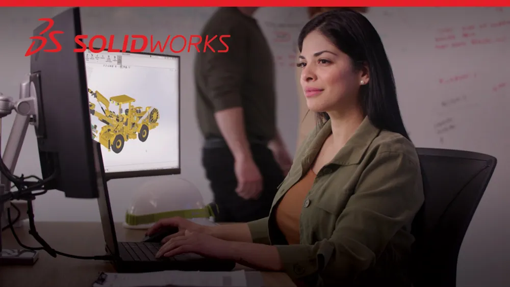 Konstrukteurin, die am Computer arbeitet – SOLIDWORKS